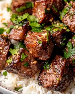 Delicious Sweet Chili Garlic Steak Bites with Coconut Rice photo