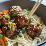 Homemade Sweet Chili Sesame Glazed Meatballs with Rice Noodles photo