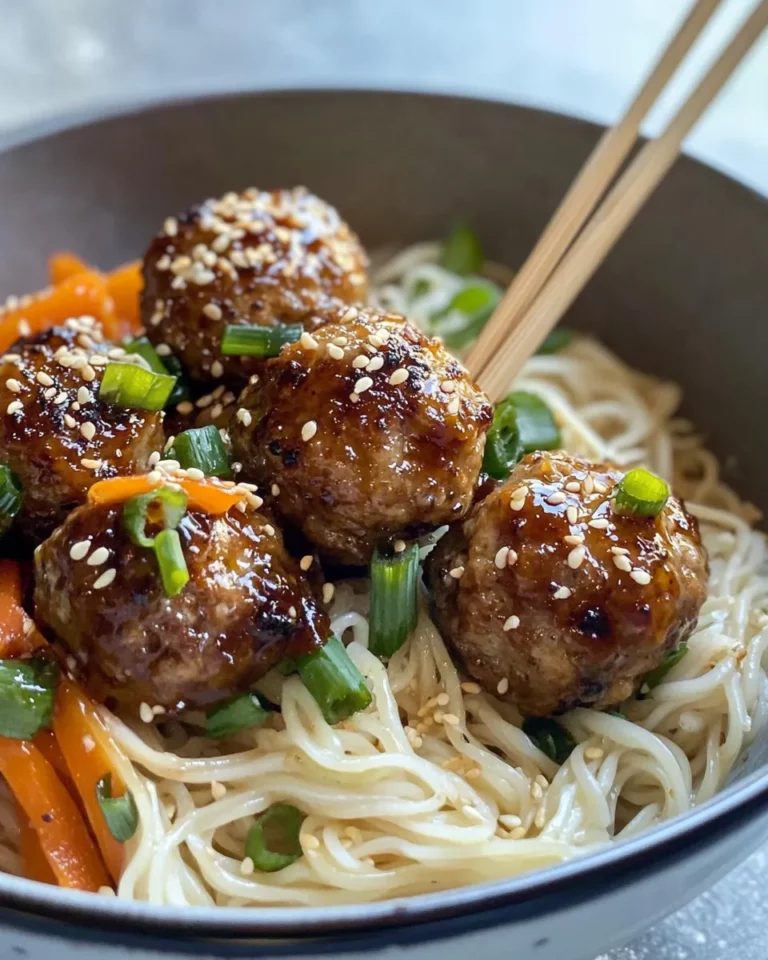 Homemade Sweet Chili Sesame Glazed Meatballs with Rice Noodles photo