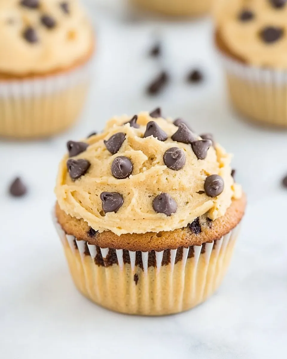 Delicious A Gluten-Free Cupcake with Chocolate Chips and Peanut Butter Frosting image