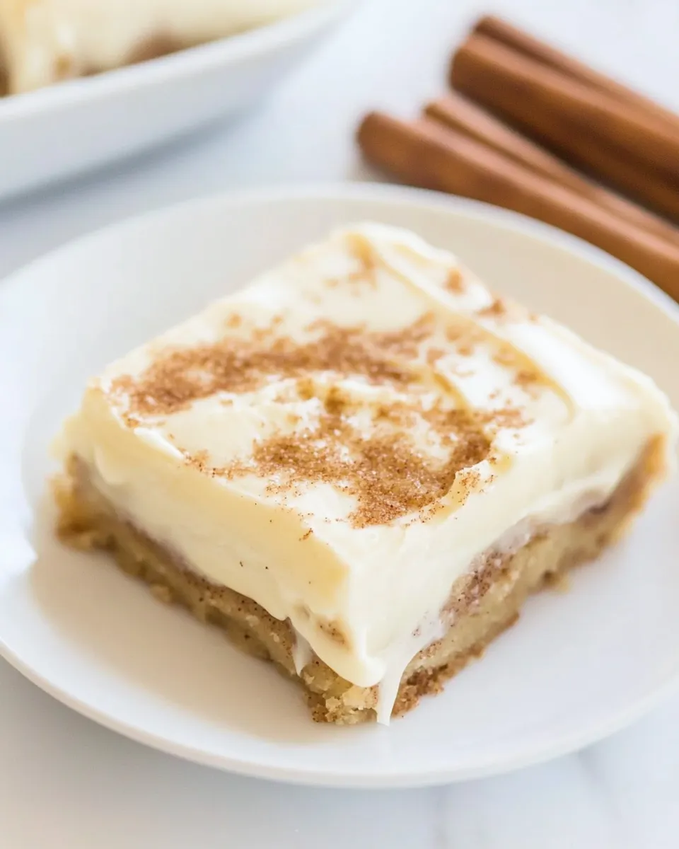 Homemade Cinnamon Roll Bars with Cream Cheese Frosting photo